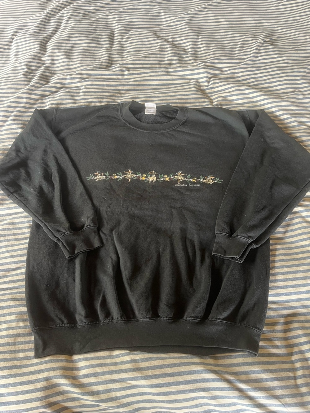 GILDAN Black Pullover with hula dancer dancing along maile lei and ipuheke sizeL